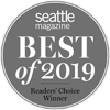 The image is a circular badge that reads "Seattle Magazine Best of 2019 Readers' Choice Winner" in white text on a gray background.
